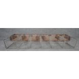 A vintage metal industrial style postal rack along with a similar mesh example. H.18 W.114 D.23cm