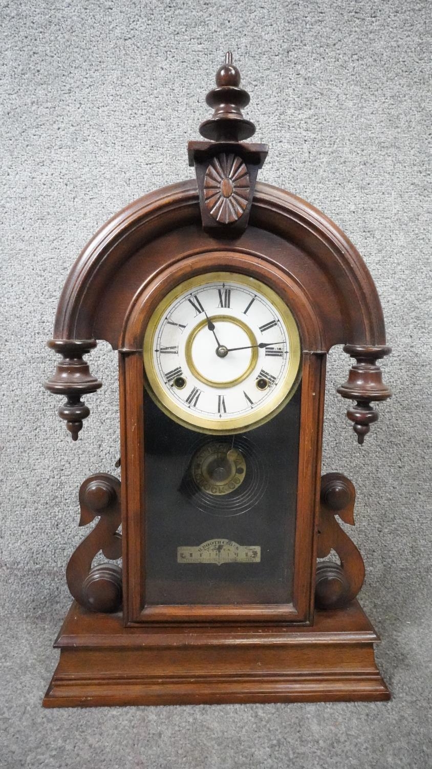 A late 19th century mahogany cased American mantel clock with eight day movement. No Key. H.60 W.