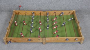 A vintage folding table top bar football game. L.100cm