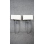 A pair of Porta Romana metal tapering wall lights with angled white linen shades. H.83