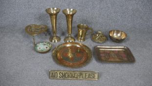 A collection of brass. Including a contemporary No Smoking sign, a pair of Indian engraved trumpet
