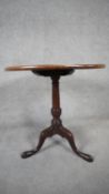 A Georgian mahogany occasional table on tripod cabriole supports. H.68cm