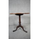 A Georgian mahogany occasional table on tripod cabriole supports. H.68cm