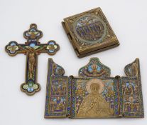 Three brass and enamelled religious items. Including a crucifix and two hinged triptych enamelled
