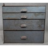 A vintage metal industrial style bank of drawers. H.49 W.58 D.28cm