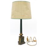 A vintage gilt metal and painted table lamp raised on fluted Classical column on decorative socle