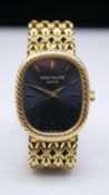 A vintage Patek Philippe Ellipse ladies 18 carat watch. With oval shaped face with blue dial and