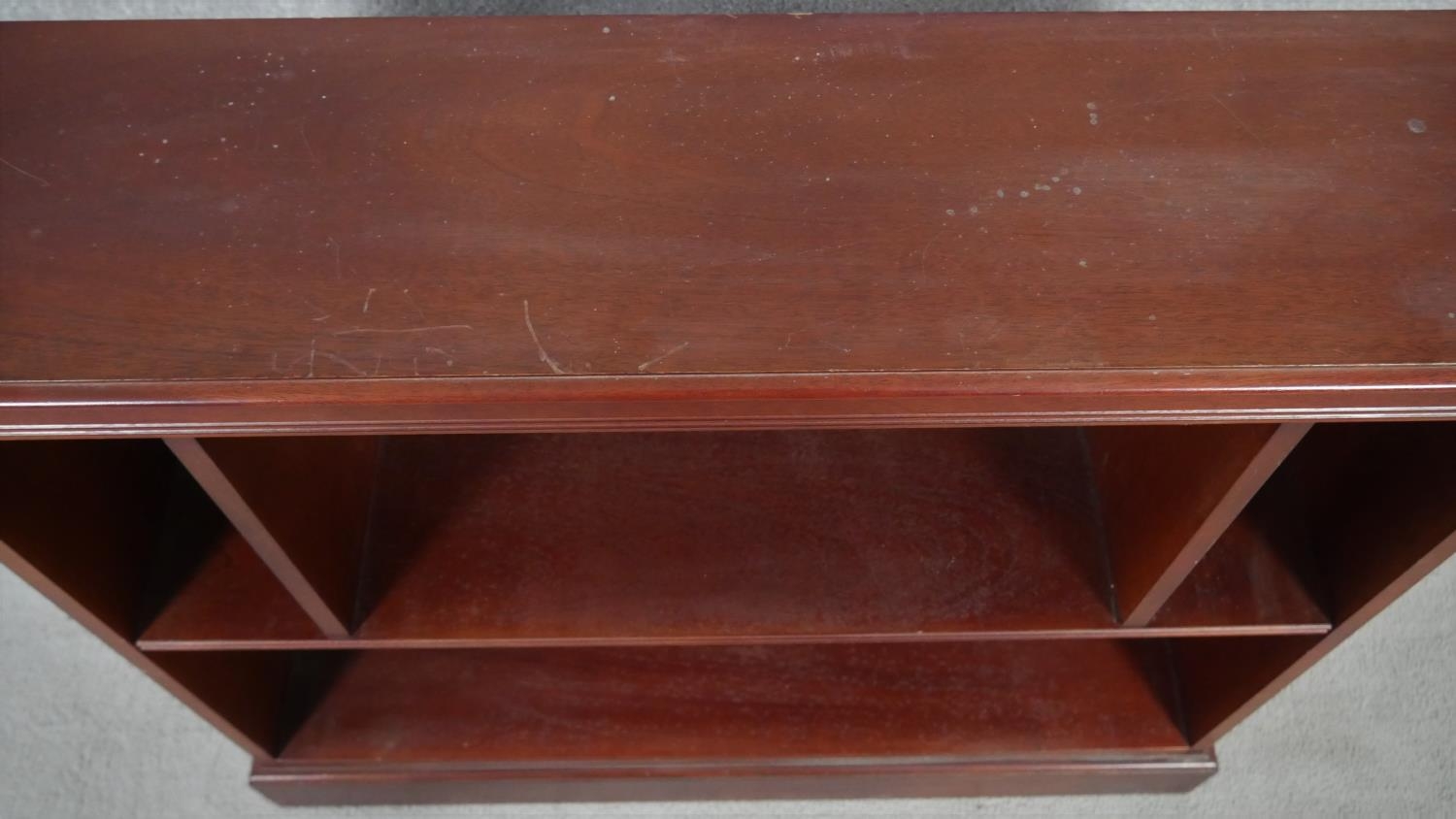 A contemporary mahogany open bookcase on plinth base. H.83 W.96.5 D.25cm - Image 3 of 3