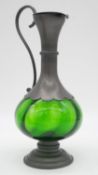 A French Art Nouveau style green glass and pewter ewer with hinged lid. Makers stamp to the base. '