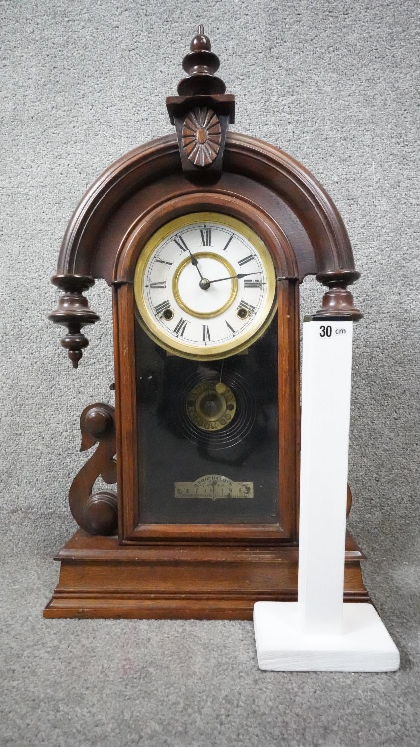 A late 19th century mahogany cased American mantel clock with eight day movement. No Key. H.60 W. - Image 5 of 5