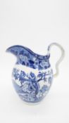 A blue and white transfer design wash jug. Numbered to the bottom. H.24cm