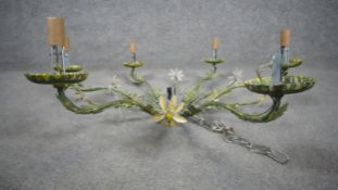 An Italian tole floral and foliate design six branch chandelier with hanging chain. chD.65cm