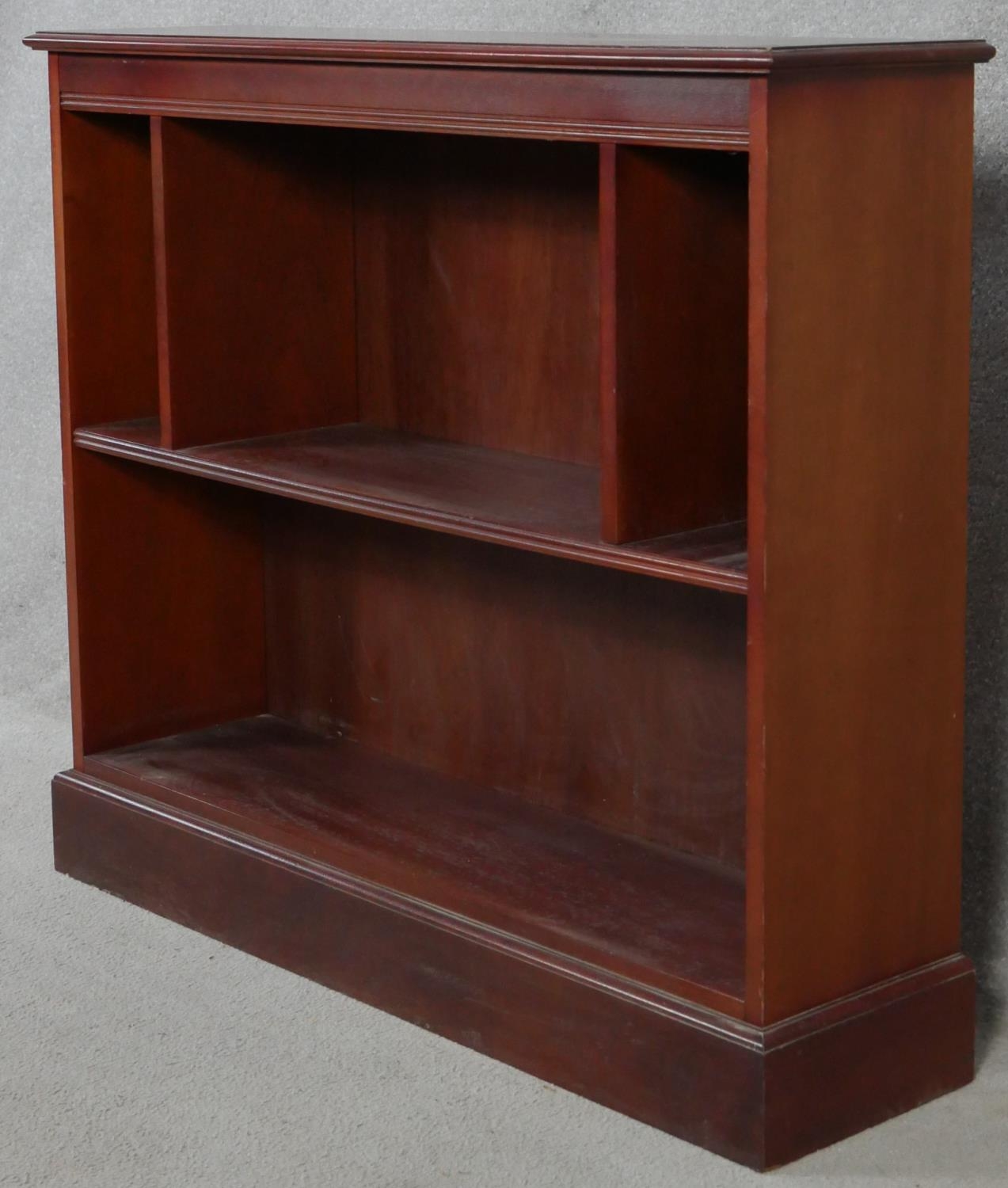 A contemporary mahogany open bookcase on plinth base. H.83 W.96.5 D.25cm - Image 2 of 3