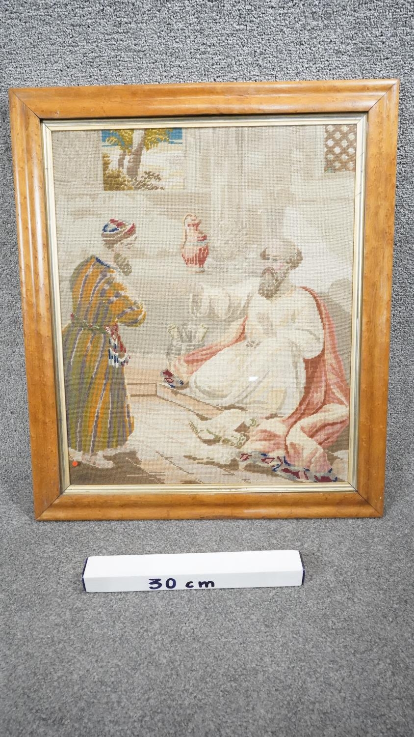 An antique framed and glazed cross stitch tapestry of a Sultan being visited by one of his subjects. - Image 4 of 4