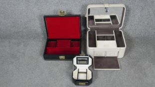 Three leather jewellery boxes. One by Jasper Conran in cream leather, one with red velour interior