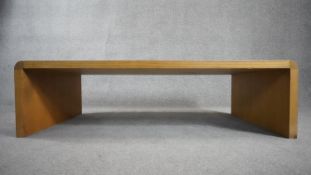 A contemporary light oak low table. H.38 W.130 D.62