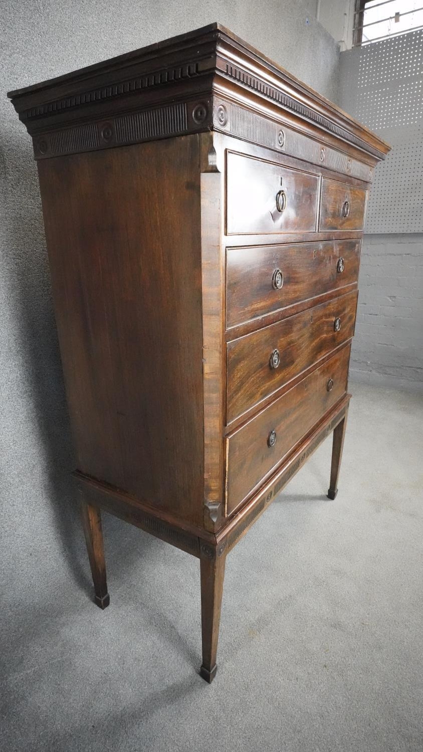 A 19th century mahogany chest on stand with dentil cornice above two short and three long drawers on - Image 2 of 4