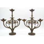 A pair of brass three branch table candelabras with scrolling foliate branches. H.38cm