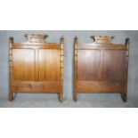 A pair of pitch pine faux bamboo style headboards for single beds. H.124 W.101 D.6cm