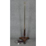 A standard lamp converted from a Regency mahogany occasional table base. H.134cm