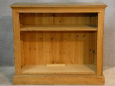 A Victorian style pine dwarf open bookcase. H.87 W.101 D.37cm
