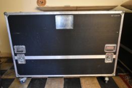A large flight case fitted to carry a 65" T.V. screen.