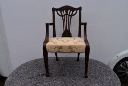 A Georgian style mahogany armchair.