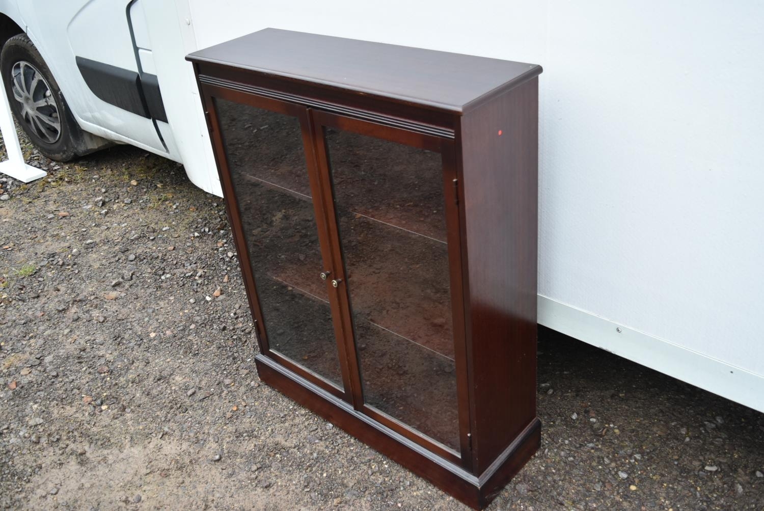 A mahogany glazed floor standing bookcase. - Image 2 of 3