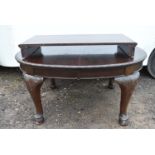 A C.1900 mahogany extending dining table with extra leaf.