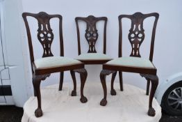 Three Chippendale style mahogany dining chairs