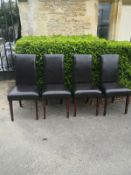 A set of four contemporary dining chairs