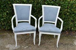 A pair of 20th Century painted armchairs