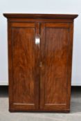 A 19th Century mahogany double wardrobe