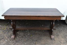A Jacobean style oak refectory style dining table.