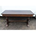 A Jacobean style oak refectory style dining table.