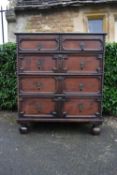 A Jacobean style oak chest of drawers.