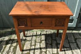 A 20th Century carved side table