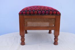 A North African style hardwood footstool.