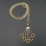 9 carat gold sapphire pendant and 40 cm chain. 2.5 grams. Pendant 29 mm x 21 mm. UK Postage £10.