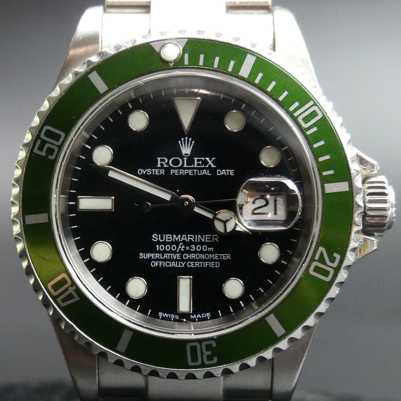 Rolex Submariner with a green bezel, dating from 2004 and with the 'Flat 4'. It has an F serial