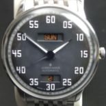 Junghams Meister Driver black face automatic stainless steel wristwatch and strap. It comes in the