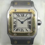 Ladies 18ct and Stainless Steel Cartier Santos quartz watch, with the original box and papers. Watch