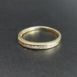 9 carat gold channel set diamond ring, size R. 2.5 mm wide 1.8 grams. UK Postage £10.
