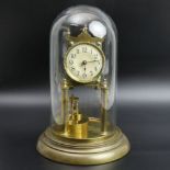 Vintage brass anniversary clock under a glass dome. 30 x 19 cm. UK Postage £25.
