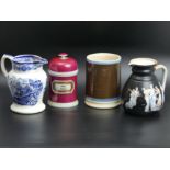 A Victorian Mocha Ware quart size pottery tankard, an apothecary jar, Samuel Alcock jug and a