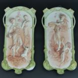 Victorian pair of German bisque hand tinted, relief moulded figural wall plaques, circa 1890. 27 cm.