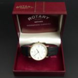 Gents 9 carat gold, quartz, date adjust movement, boxed, Rotary watch. 35 mm wide including