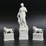 A pair of 19th century bisque porcelain Trafalgar Square Lions and a bisque porcelain classical