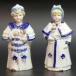 A pair of German late 19th century blue and white porcelain "Nodder" figures. 17 cm tall. UK Postage