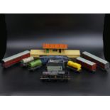 Various Hornby locomotives, rolling stock and a station. UK Postage £15.